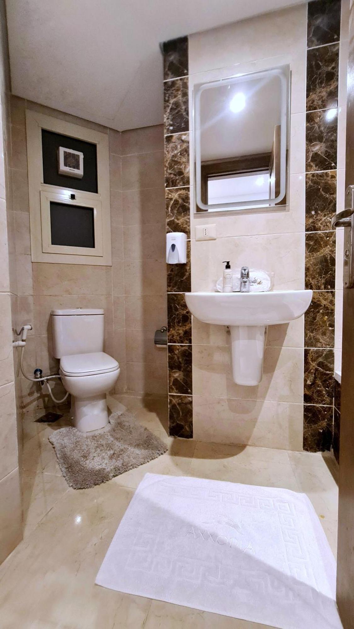 Axxodia- Duplex Porto New Cairo Aparthotel Bagian luar foto