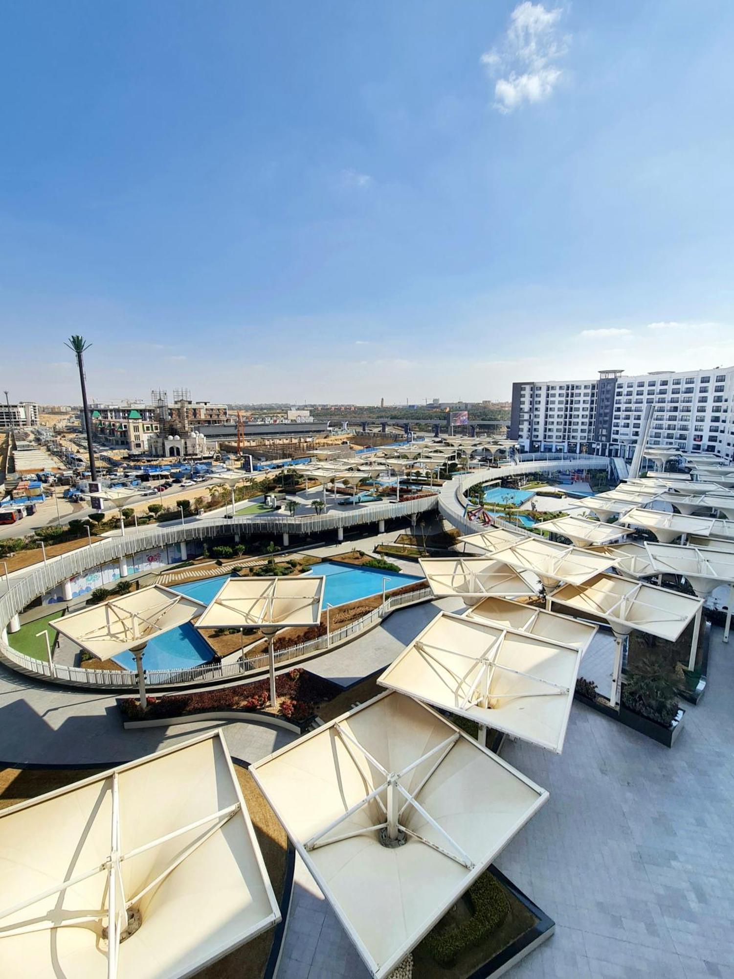 Axxodia- Duplex Porto New Cairo Aparthotel Bagian luar foto
