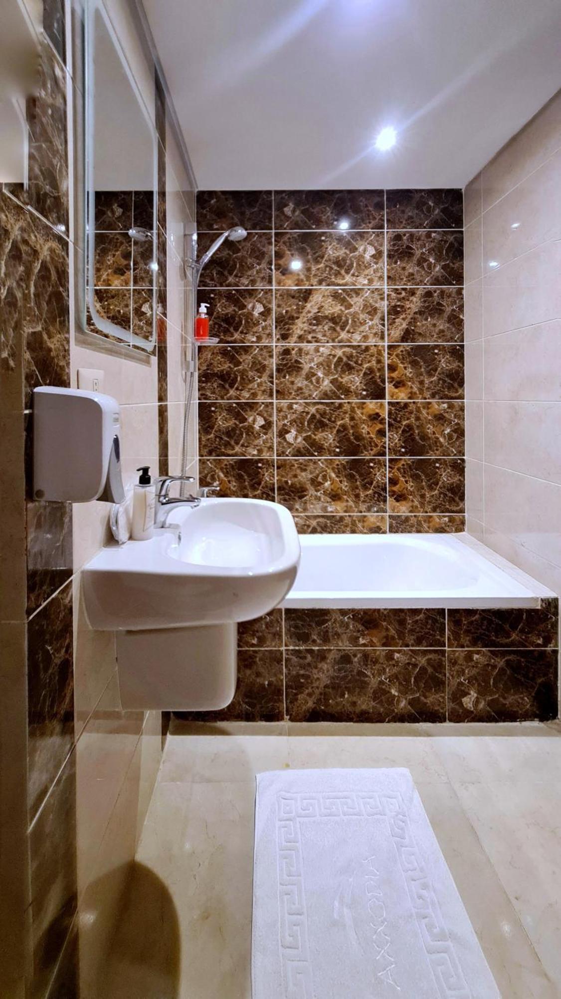 Axxodia- Duplex Porto New Cairo Aparthotel Bagian luar foto