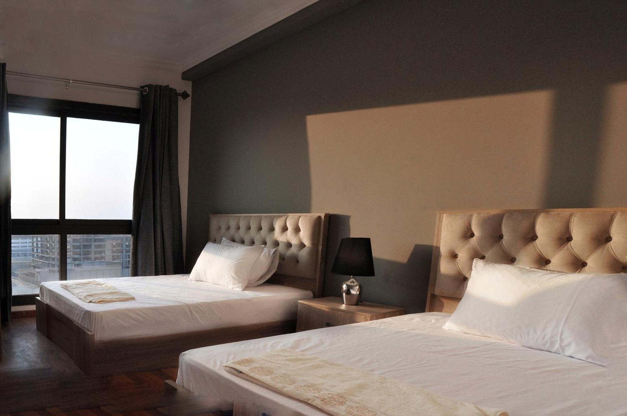 Axxodia- Duplex Porto New Cairo Aparthotel Bagian luar foto